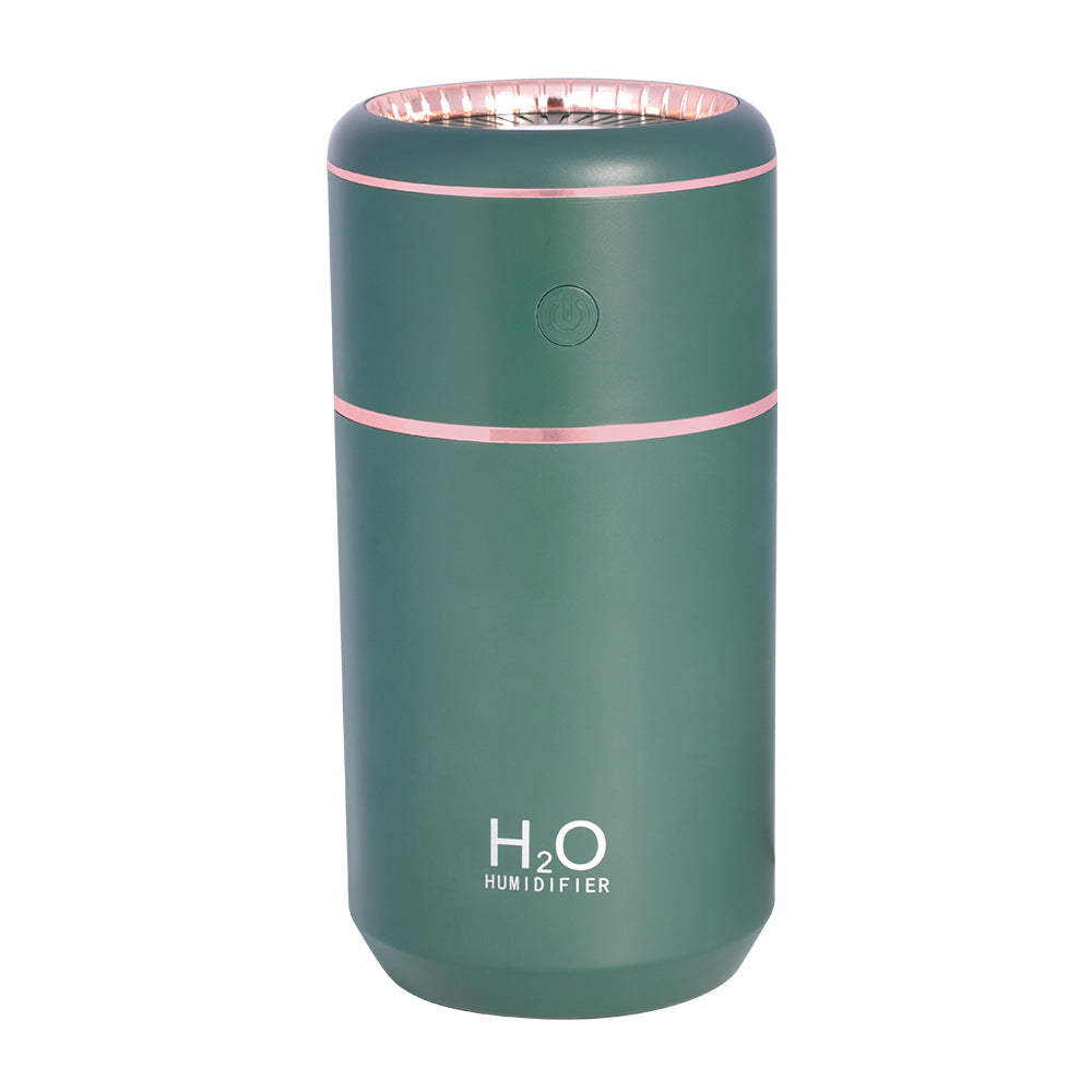 Green USB Humidifier with Colorful Light on a white surface
