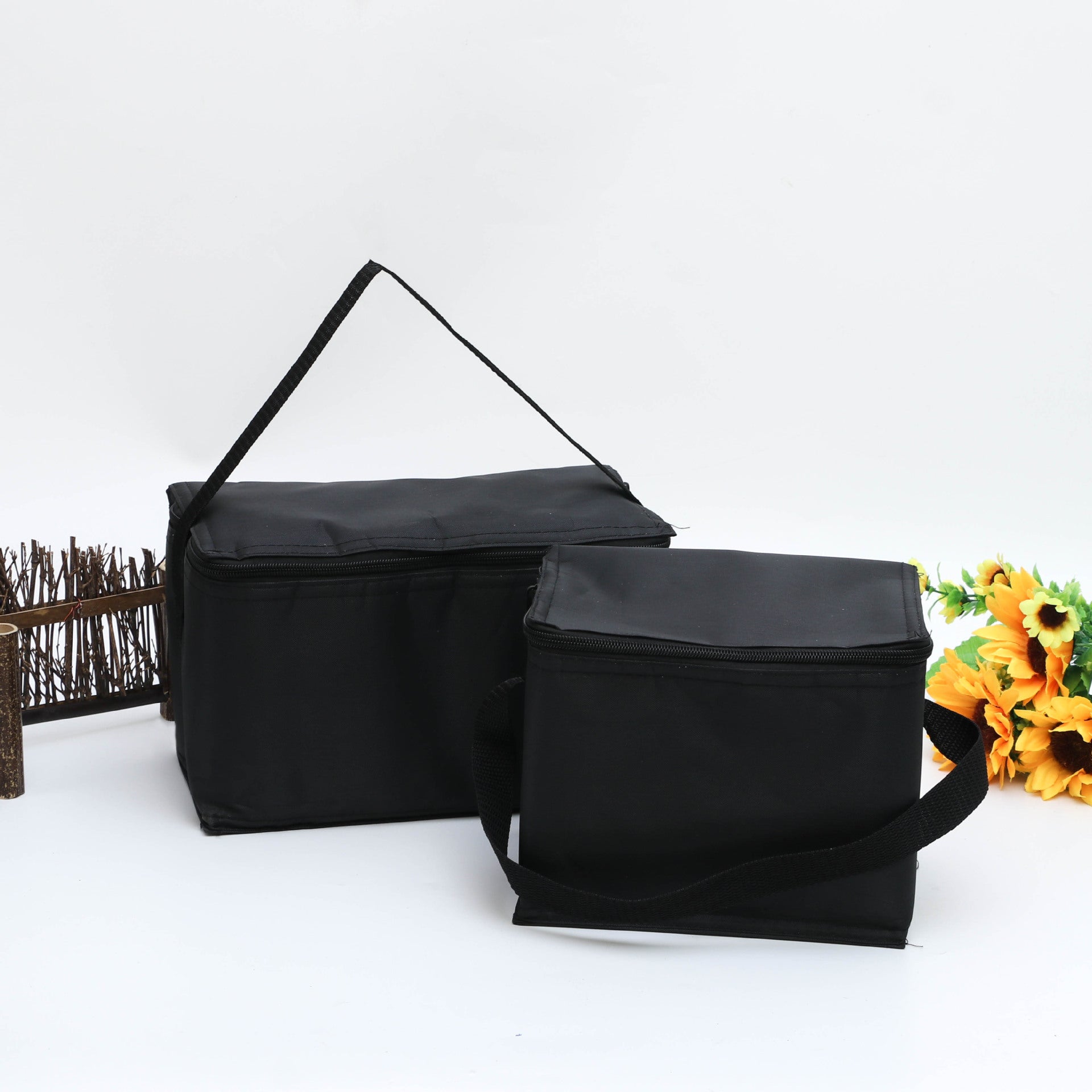 Black Insulated Cooler Bag on a gray surface