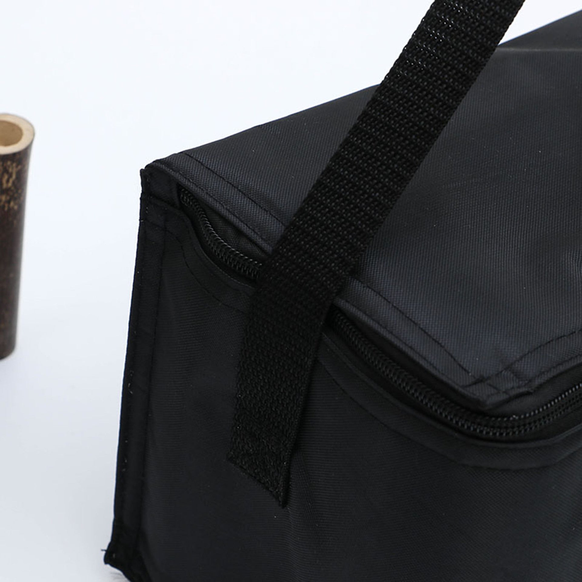 Black Insulated Cooler Bag on a gray surface